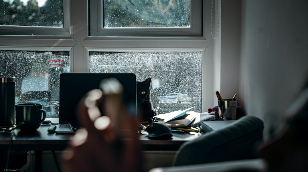 leader reflecting in quiet office