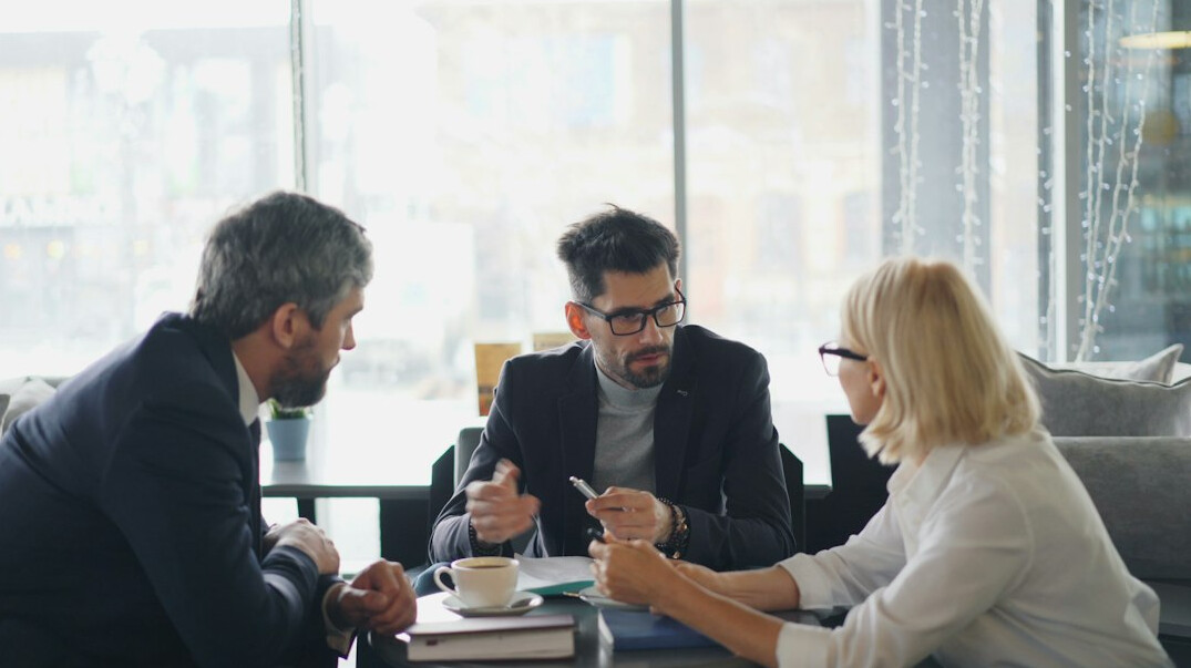 insurance executive leading team